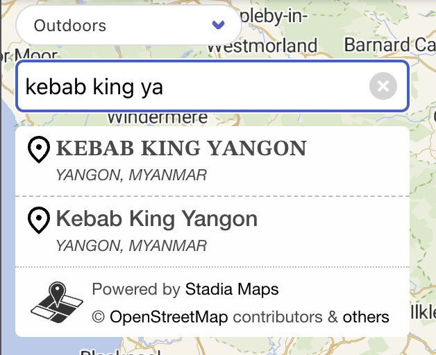 A screenshot of a search result list showing two copies of the Kebab King Yangon, one in plain ASCII and the other using the math symbols
